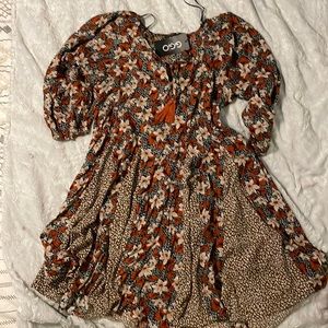 NWT. Boutique dress. Size small but better for med or large